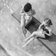 Illustration for article titled Photographers Love a Pretty Woman on a Diving Board